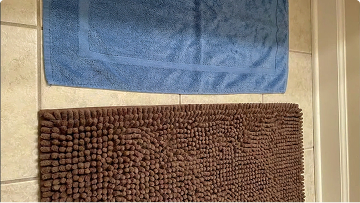 https://d31j9hgdva1w9a.cloudfront.net/muddymatcom/main-page/reviews/bathroom-rugs-comment-3.webp