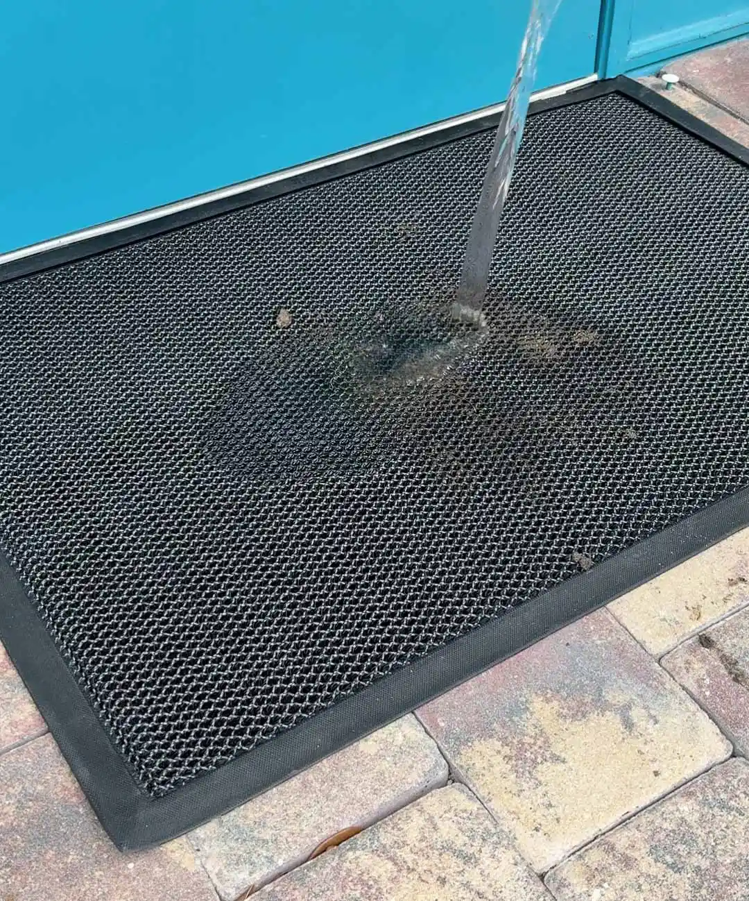 “Doesn’t absorb water—focuses on dirt control”